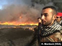 Mohammed says there is a company working to put out one fire, but progress is slow and other fires are not being attended to in Qayyarah, Iraq, Nov. 5, 2016.
