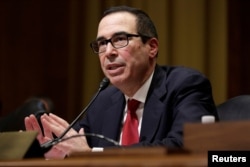 Steven Mnuchin testifies before a Senate Finance Committee confirmation hearing on his nomination to be Treasury secretary in Washington, Jan. 19, 2017.
