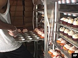 Curbside Cupcake's co-owner says he sells 1,000 cupcakes each day.