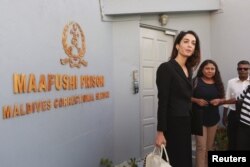 FILE - Amal Clooney, an international lawyer, in the Maldives, Sept. 8, 2015. Clooney is says Azerbaijan is abusing its power by trying to silence critics of the regime, including imprisoned reporter Khadija Ismayilova.