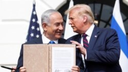 Izraelski premijer Benjamin Netanjahu i američki predsednik Donald Tramp posle potpisivanja sporazuma Abraham o normalizaciji odnosa Izraela sa nekoliko bliskoistočnih suseda, 15. septembra 2020. u Beloj kući.
