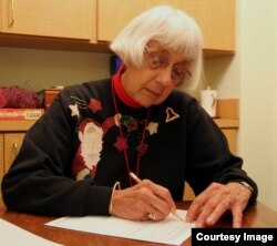 Emily Schornstein of Columbus, Ohio, takes a self-administered test designed to spot symptoms of cognitive issues like Alzheimer's disease. (Courtesy The Ohio State University)