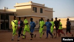 FILE - Former members of the militant group al-Shabab are held inside the prison in Garowe, Puntland state in northeastern Somalia, Dec. 14, 2016. Al-Shabab claimed responsibility for the shooting death of a Puntland senior official, Dec. 20, 2016.