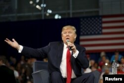 FILE - Republican presidential candidate Donald Trump addresses the crowd during a forum in Aiken, S.C., Dec. 12, 2015.