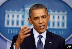 FILE: Then-President Barack Obama speaks about the government shutdown and debt limit, in the James Brady Press Briefing Room of the White House in Washington, Oct. 8, 2013.