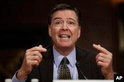 FILE - FBI Director James Comey testifies on Capitol Hill in Washington, May 3, 2017, before the Senate Judiciary Committee hearing: "Oversight of the Federal Bureau of Investigation."