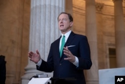 FILE - Sen. Pat Toomey, R-Pa., speaks on Capitol Hill in Washington, Oct. 2, 2018.