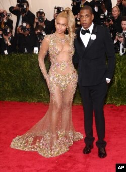 Beyonce, left, and Jay-Z arrive at The Metropolitan Museum of Art's Costume Institute benefit gala celebrating "China: Through the Looking Glass" on May 4, 2015, in New York.
