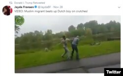 A screenshot shows a frame of one of the anti-Muslim videos retweeted by President Donald Trump, Nov. 29, 2017.