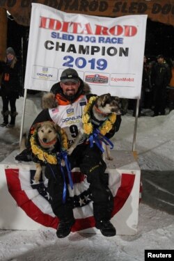 Pete Kaiser of of Bethel, Alaska poses after winning the Iditarod Trail Sled Dog Race after crossing the finish line in Nome, Alaska, U.S. March 13, 2019. REUTERS/Diana Haecker/Nome Nugget