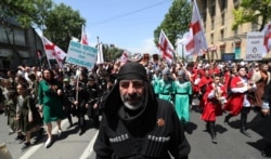 GEORGIA -- People attend a rally marking the Day of Family Purity and opposing the International Day Against Homophobia and Transphobia in Tbilisi, May 17, 2018.