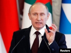 Russia's President Vladimir Putin speaks during a news conference, part of the Gas Exporting Countries Forum (GECF), in Moscow, July 1, 2013.