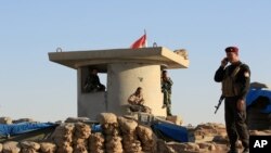 Kurdish Peshmerga fighters are seen in Karez area, west of Mosul, Iraq, October 17, 2017.