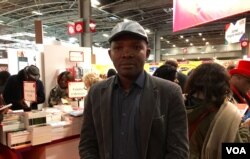 Beninese publisher Koffi Attedi thinks French can thrive without Macron's language plan. (L.Bryant/VOA)