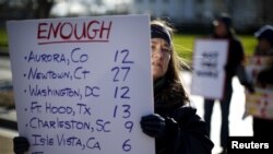 Gun control activists rally in front of the White House in Washington, Jan. 4, 2016.