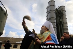 UKRAINE – Metropolitan Platon of Feodosia and Kerch blesses Russian air-defense system S-400 deployed in Feodosia, Crimea, January 14, 2017