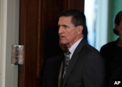 FILE - Then-national security adviser Michael Flynn in seen the East Room of the White House in Washington, Feb. 13, 2017.
