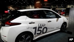 Nissan LEAF is displayed during the media preview of the Chicago Auto Show at McCormick Place, Thursday, Feb. 7, 2019, in Chicago. (AP photo/Nam Y. Huh)