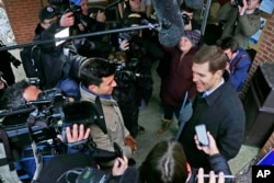 Conor Lamb, the Democratic candidate for the March 13 special election in Pennsylvania's 18th Congressional District, talks with reporters in Carnegie, Pennsylvania, March 13, 2018.
