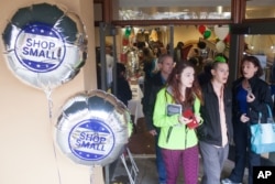 Consumers visit the Shop Small, Shop Ethnic Holiday Shopping Market on Small Business Saturday at Hing Hay Park in Seattle, Nov. 26, 2016.