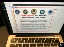 FILE - This April 6, 2018, file photo shows a screenshot of Backpage.com on the day that federal authorities seized the classified site as part of a criminal case.