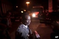 FILE - Gen. Gilbert Diendere speaks to media in Ouagadougou, Burkina Faso.