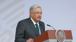FILE - Mexico's President Andres Manuel Lopez Obrador speaks before the traditional military parade to mark the bicentennial of Mexico's Independence from Spain, at the Zocalo square in Mexico City, Sept. 16, 2021.