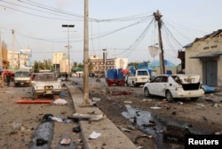 FILE - A general view shows the scene of an explosion in Mogadishu, Somalia, Nov. 9, 2018.