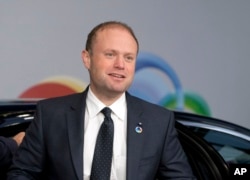 FILE - Malta's Prime Minister Joseph Muscat arrives for an Eastern Partnership Summit in Brussels, Nov. 24, 2017.