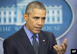 FILE - President Barack Obama speaks during a news conference in the White House Brady Press Briefing Room in Washington, Dec. 18, 2015.