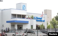 Planned Parenthood employees watch pro-choice and pro-life supporters protest as a deadline looms to renew the license of Missouri's sole remaining Planned Parenthood clinic in St. Louis, Missouri, May 31, 2019.