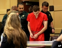 Florida high school shooting suspect Nikolas Cruz appears in court for a status hearing, in Fort Lauderdale, Florida, Feb. 19, 2018.