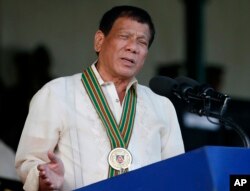 Philippine President Rodrigo Duterte addresses army troops during the 120th anniversary celebration of the Philippine Army, April 4, 2017 at Fort Bonifacio, suburban Taguig city, east of Manila, Philippines.