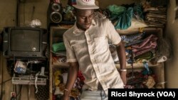 A tailor works in Dakar's Niary Tally neighborhood, the working class area where Dakar Fashion Week held their "Street Parade" fashion show this year, June 29, 2017. The show is free and takes place in an open and public area each year as part of Dakar Fa