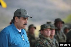 Predsednik Venecuele Nikolas Maduro prisustvuje vojnoj vežbi u Turiamu, Venecuela, 3. februara 2019.(Miraflores Palace/Handout via Reuters)