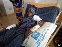 A man receives treatment at the Jos University teaching hospital in Jos, Nigeria, June 25, 2018, after clashes in central Nigeria between mostly Muslim herders and Christian farmers.