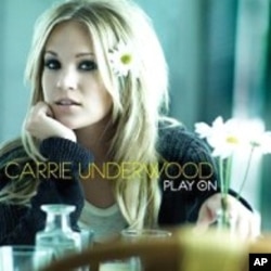 Lambert Reponds to Complaints About American Music Award Performance; Jackson Items Auctioned