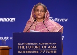 FILE - Bangladesh's Prime Minister Sheikh Hasina delivers a speech at a session of the International Conference on "The Future of Asia" on May 30, 2019, in Tokyo, Japan.