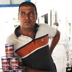 Sami Bahkeer in a shop at the Shati refugee camp in Gaza City