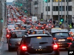 Traffic lines a street in Brussels, Belgium, Nov. 24, 2015. Brussels is keeping its terror alert at the highest level.