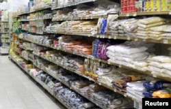 FILE - Food items are seen in a supermarket in Doha, Qatar, June 7, 2017.