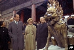 FILE - In this Feb 24, 1972 file photo, U.S. President Richard M. Nixon and first lady Pat Nixon are seen as they visit the tombs of Chinese emperors of the Ming Dynasty, in the suburbs of China's capital of Beijing. (AP Photo)