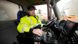 Chris Vigil prepares his snowplow for operation as forecasters predict the first snow of the season to sweep over Front Range communities Dec. 9, 2021, at the Colorado Department of Transportation shed in Castle Rock, Colo.