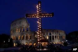 A view of the ancient Colosseum in Rome, April 14, 2017. Pope Francis presided over the Via Crucis (Way of the Cross) torchlight procession on Good Friday in front of Rome's Colosseum.
