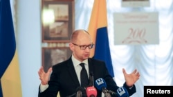 Ukrainian Prime Minister Arseniy Yatsenyuk accused Russia on Sunday of engineering deadly clashes in Odessa during a speech in Odessa May 4, 2014.
