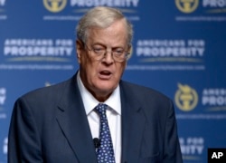 In this Aug. 30, 2013 file photo, David Koch speaks in Orlando, Florida.