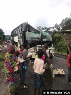 A bus attacked by armed separatist is seen at Akum, a village 10 Kilometers from Bamenda, the capital of the Cameroon's English speaking northwest region, Sept. 9, 2018.