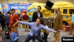 Berkshire Hathaway shareholders pose with Mr. Peanut at the shareholder shopping day as part of the Berkshire Hathaway annual meeting weekend in Omaha, Nebraska, May 5, 2017.