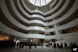 This May 31, 2011, file photo, shows the interior of the Solomon R. Guggenheim Museum, architect Frank Lloyd Wright and built from 1956-1959, in New York. (AP Photo/Kathy Willens, File)