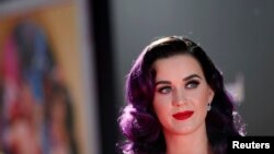 Cast member and singer Katy Perry poses at the premiere of "Katy Perry: Part of Me" at the Grauman's Chinese theatre in Hollywood, California June 26, 2012.